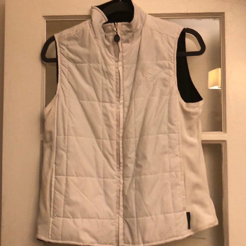 Women’s size small, Mercedes Benz reversible, ski vest, white one side, black